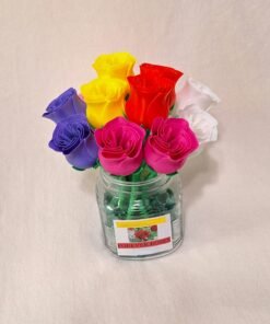 Bouquet of varied colored roses in glass vase