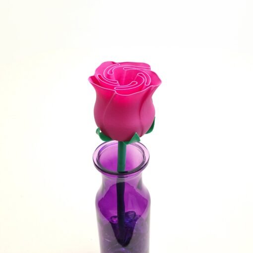 Small Pink Rose in purple vase